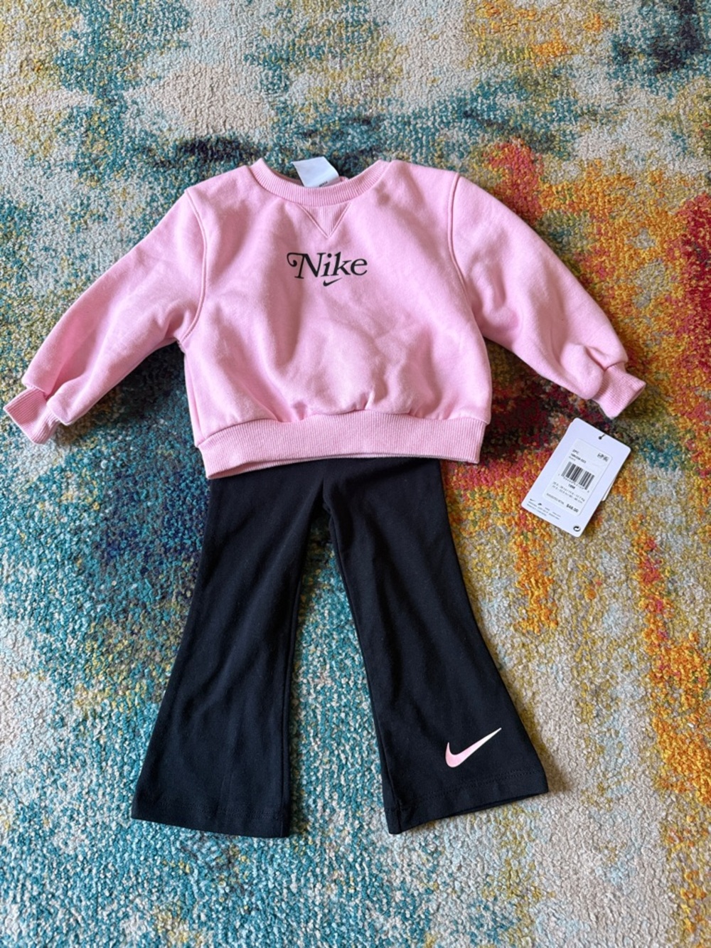 Nike Pink Crewneck Sweatshirt with Black Flared Pants